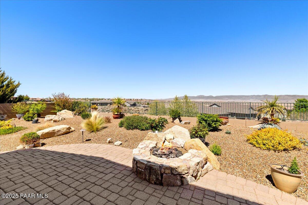 1149 Stack Rock Road Prescott Valley, AZ 86314 - Photo 39 of 85 a view of a terrace with lawn chairs