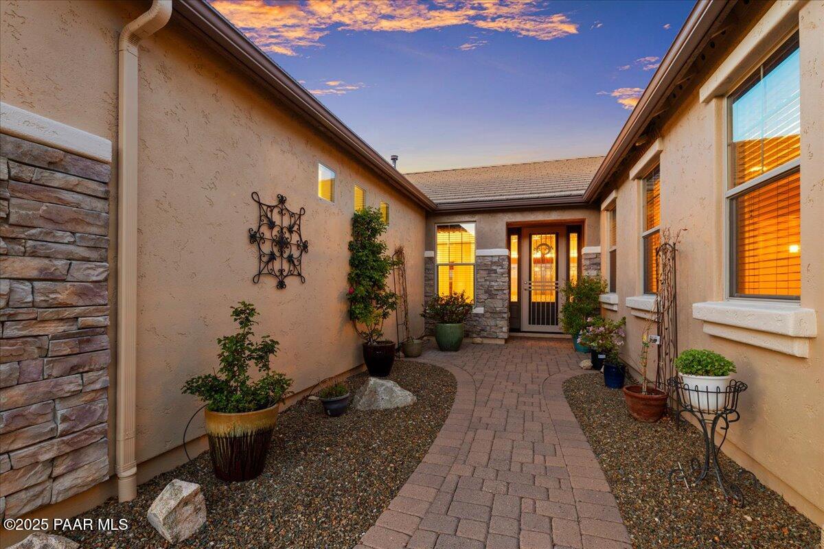 1149 Stack Rock Road Prescott Valley, AZ 86314 - Photo 4 of 85 a lobby with furniture and potted plants