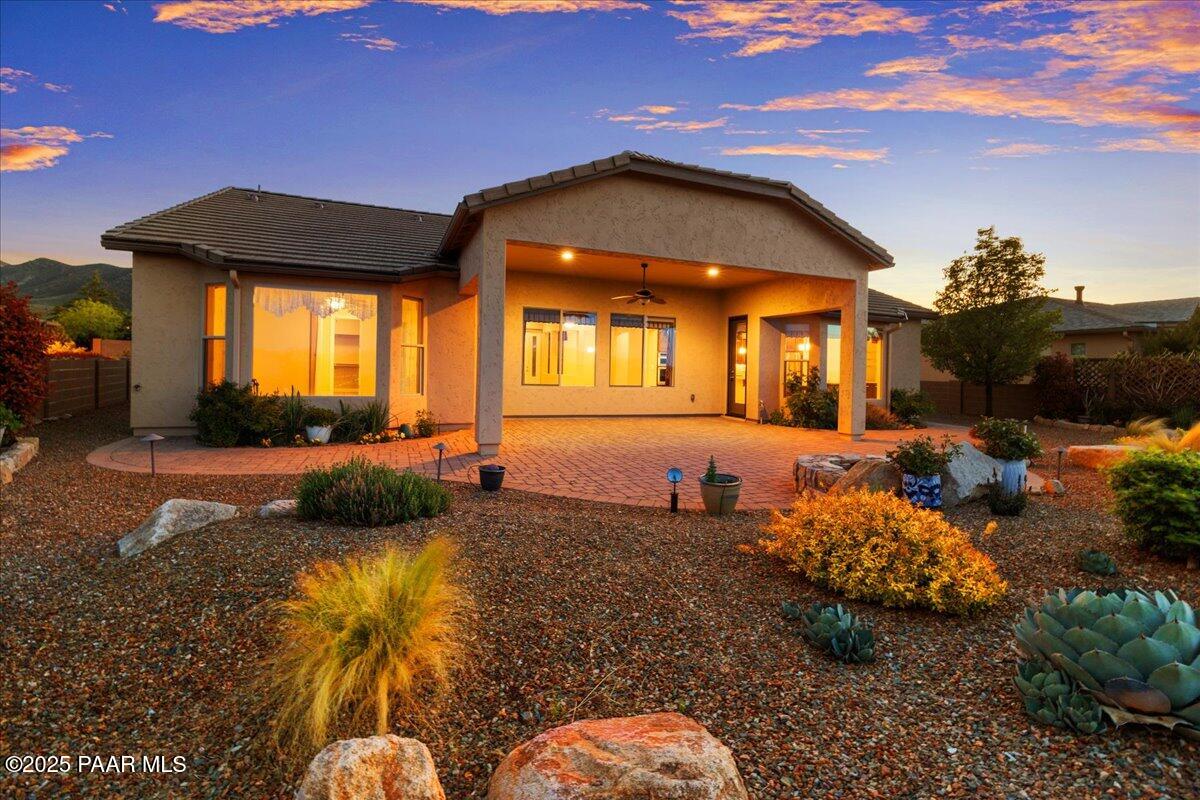 1149 Stack Rock Road Prescott Valley, AZ 86314 - Photo 46 of 85 a view of a house with a swimming pool