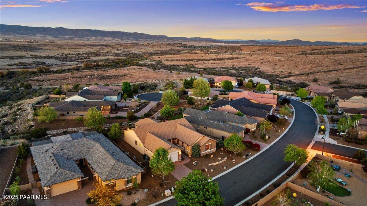1149 Stack Rock Road Prescott Valley, AZ 86314 - Photo 53 of 85 an aerial view of residential houses with outdoor space