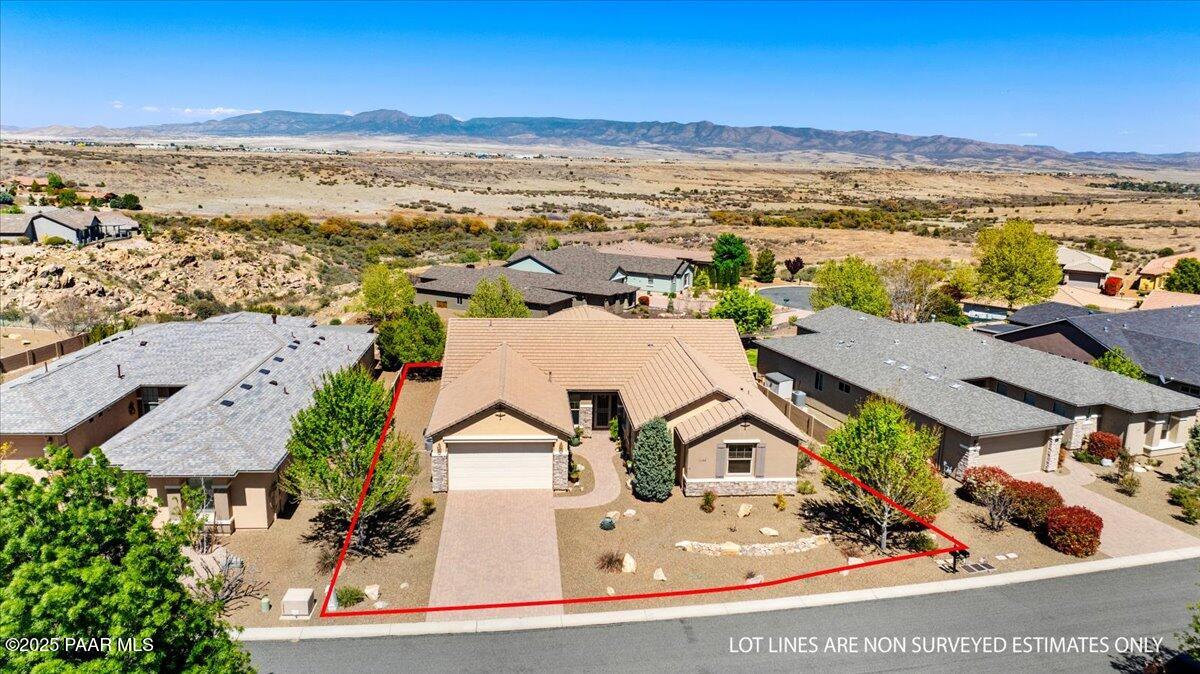 1149 Stack Rock Road Prescott Valley, AZ 86314 - Photo 55 of 85 an aerial view of residential houses with outdoor space
