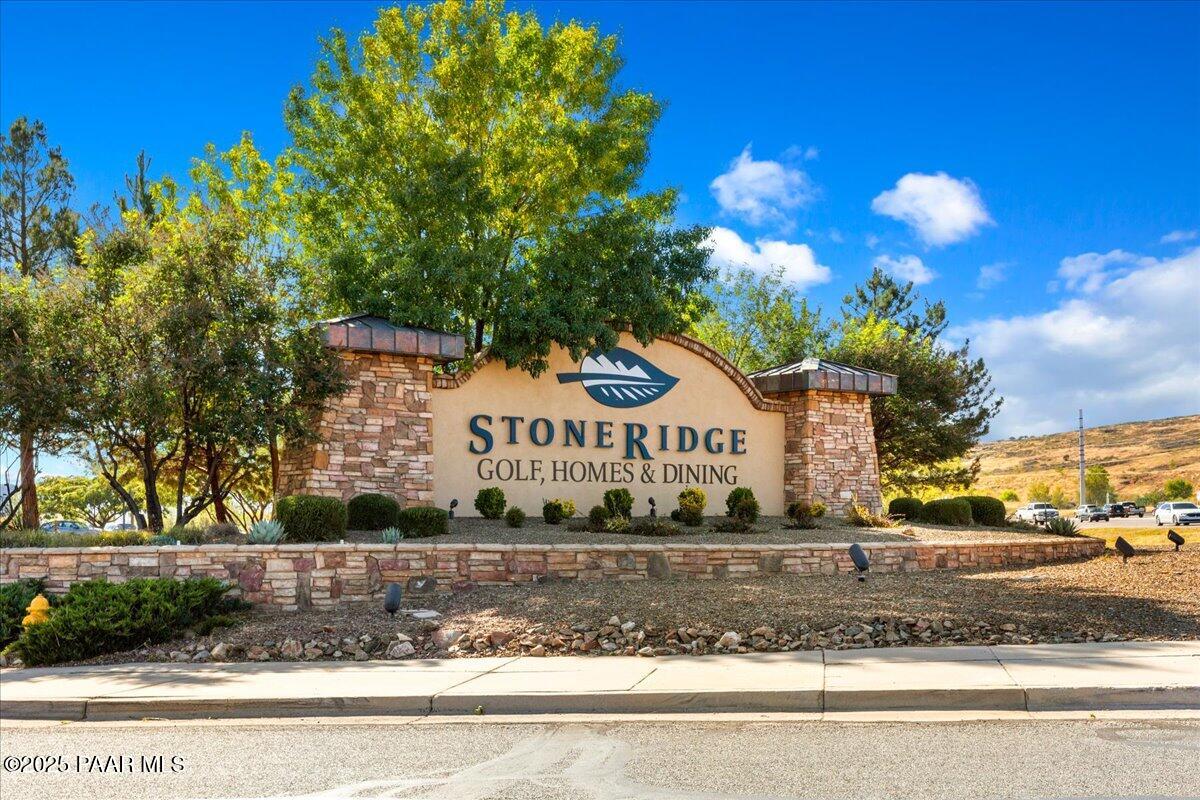 1149 Stack Rock Road Prescott Valley, AZ 86314 - Photo 61 of 85 a front view of a house with a yard