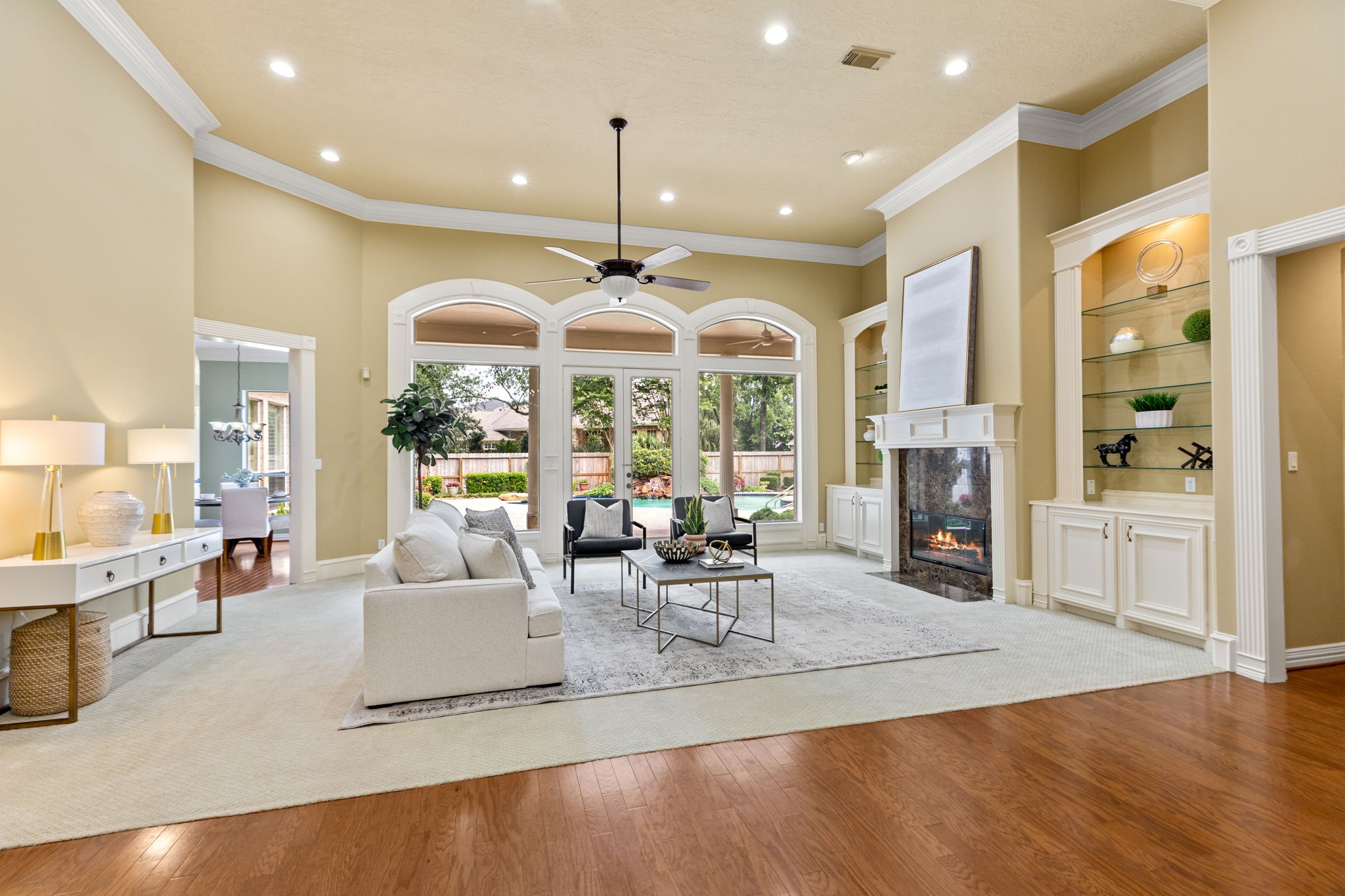 6610 Radley Drive Spring, TX 77379 - Photo 8 of 50 Huge formal living room w/ marble fireplace offers full view of your private outdoor living.