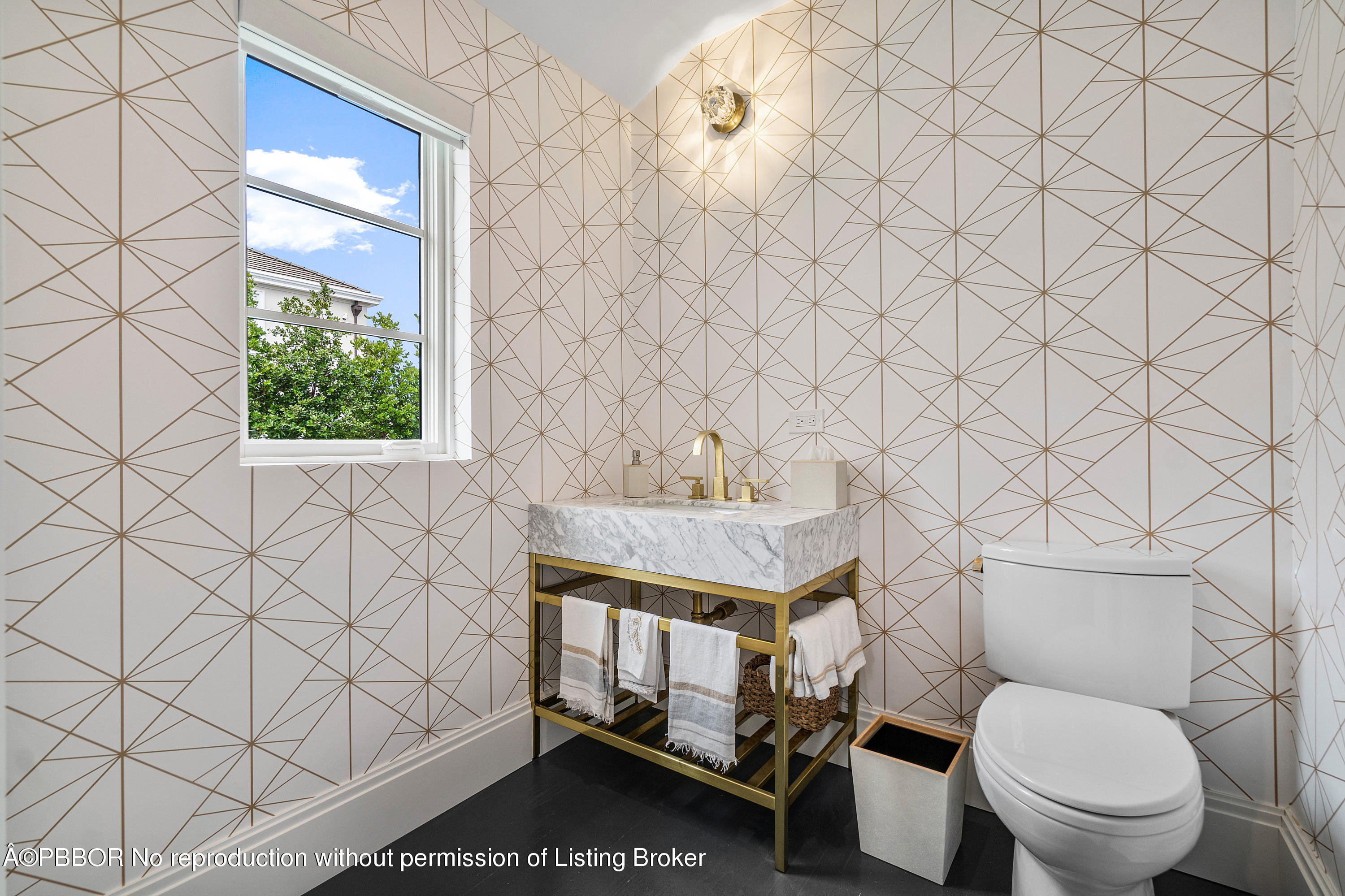 145 Kings Road Palm Beach, FL 33480 - Photo 12 of 25 a bathroom with a toilet and a shower curtain