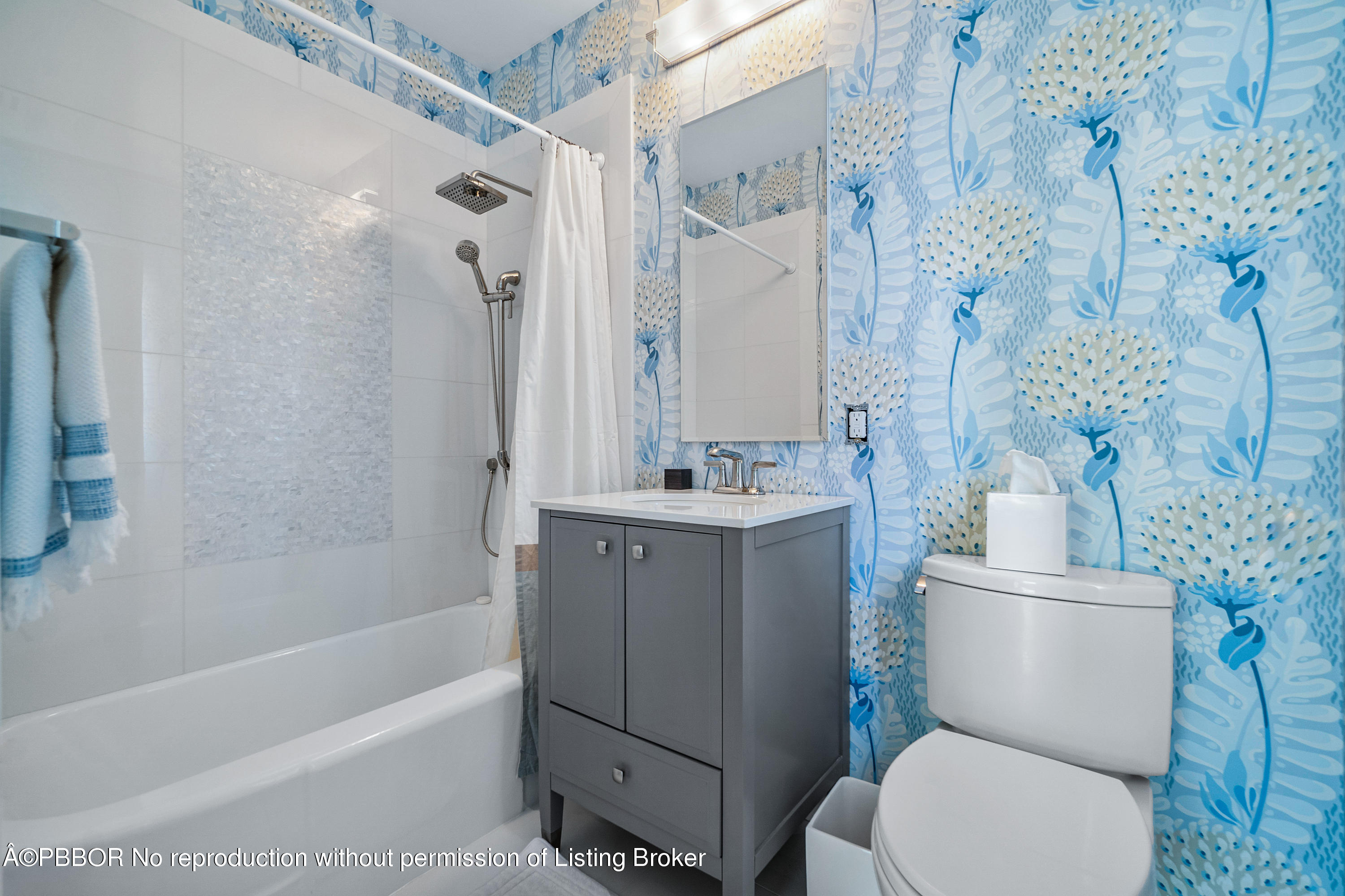 145 Kings Road Palm Beach, FL 33480 - Photo 22 of 25 a bathroom with a sink toilet and shower