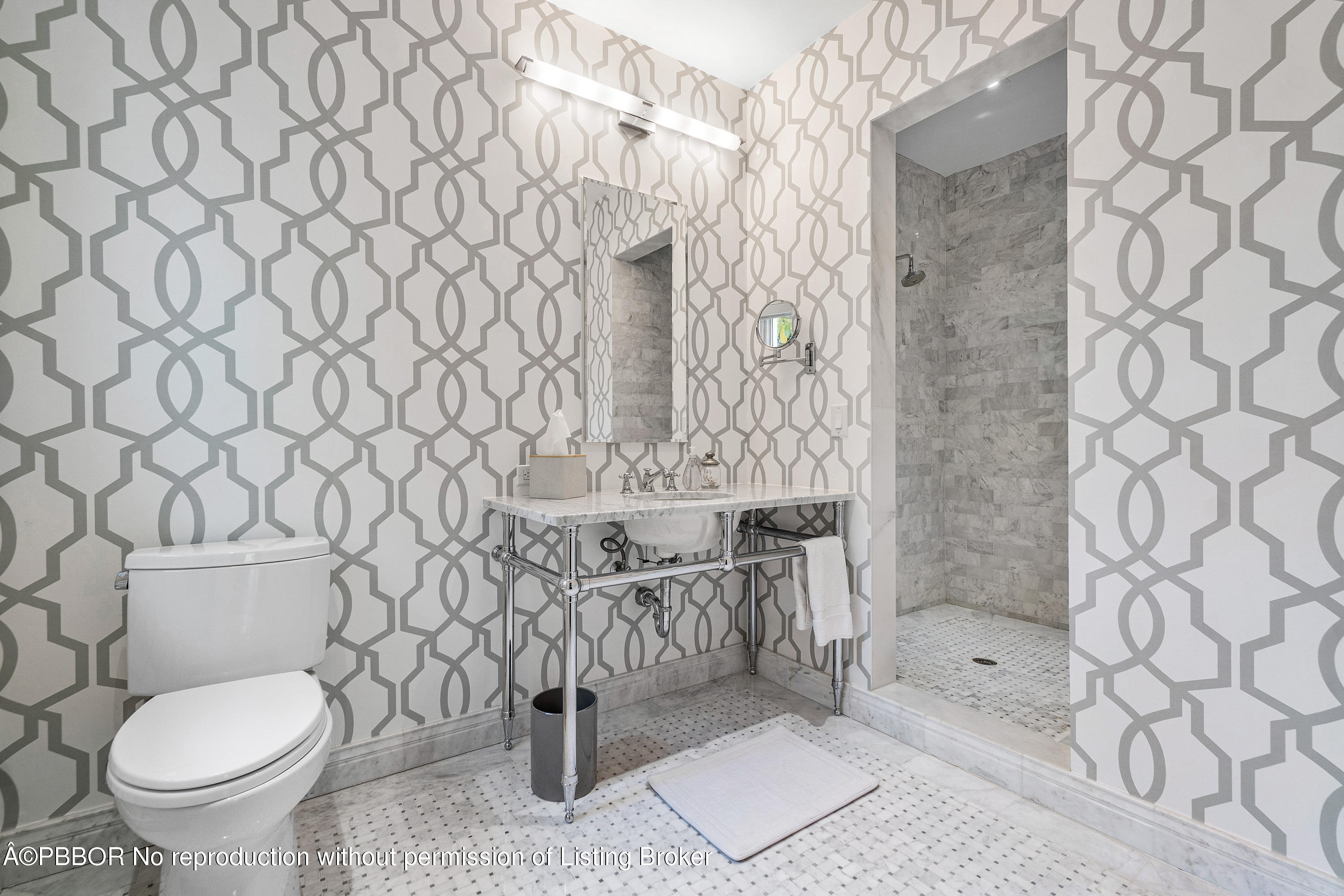145 Kings Road Palm Beach, FL 33480 - Photo 23 of 25 a bathroom with a toilet and a shower curtain