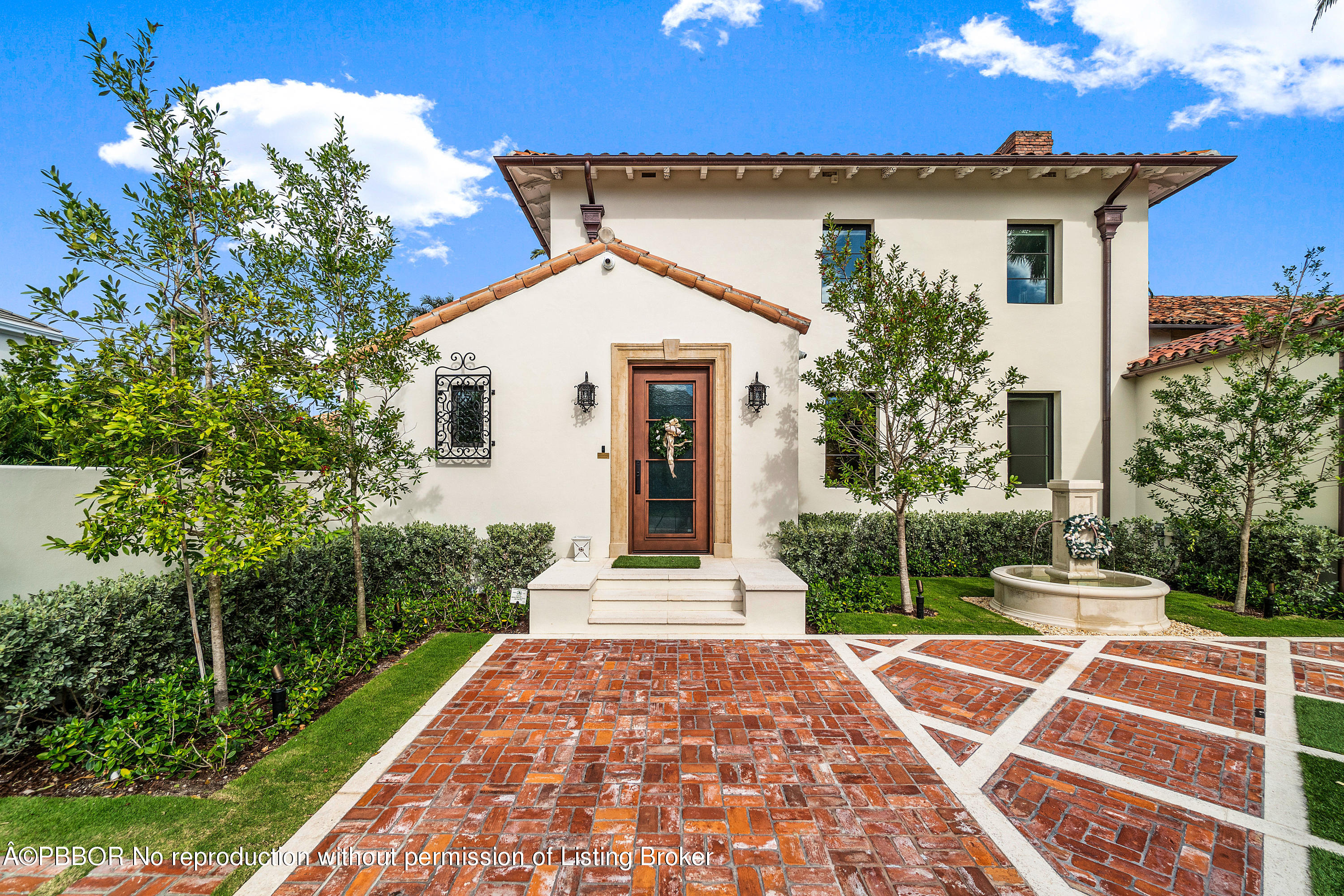 145 Kings Road Palm Beach, FL 33480 - Photo 3 of 25 a front view of a house with a yard
