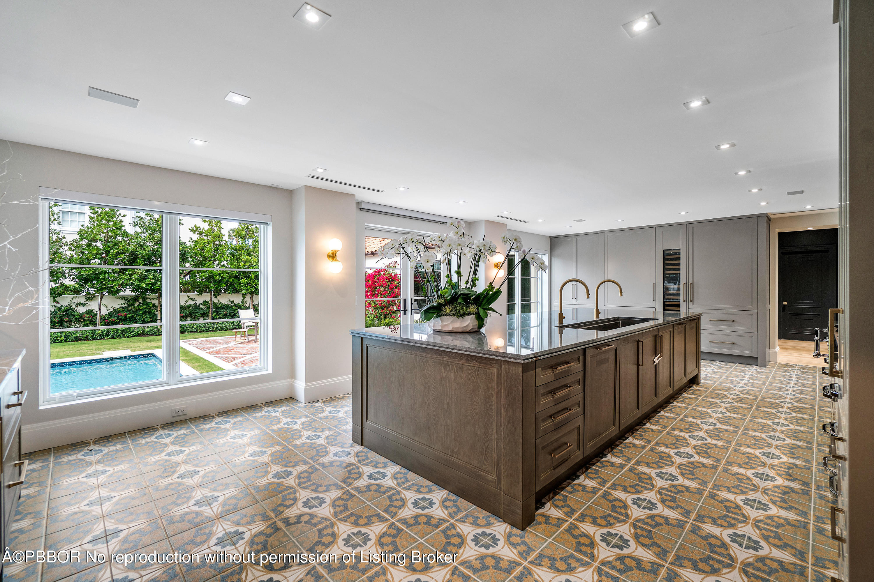 145 Kings Road Palm Beach, FL 33480 - Photo 8 of 25 a living room with stainless steel appliances granite countertop cabinets and wooden floor