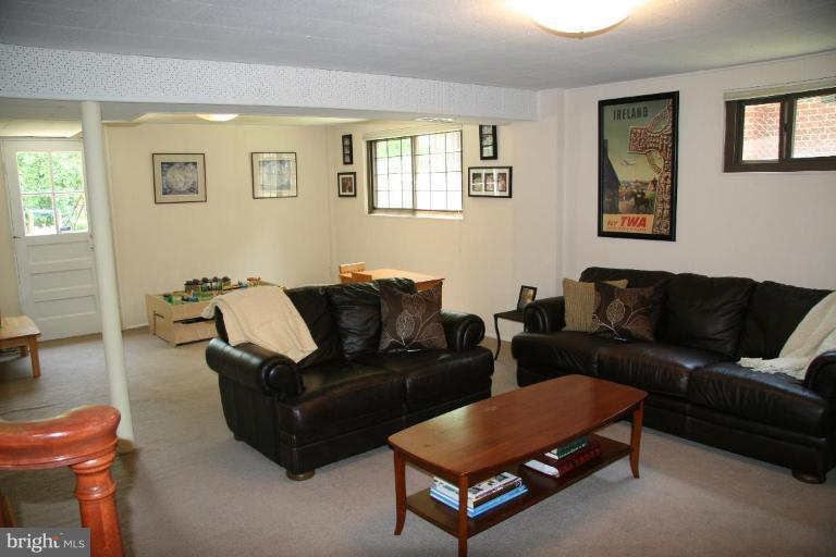 10009 Renfrew Road Silver Spring, MD 20901 - Photo 11 of 13 a living room with furniture and a window