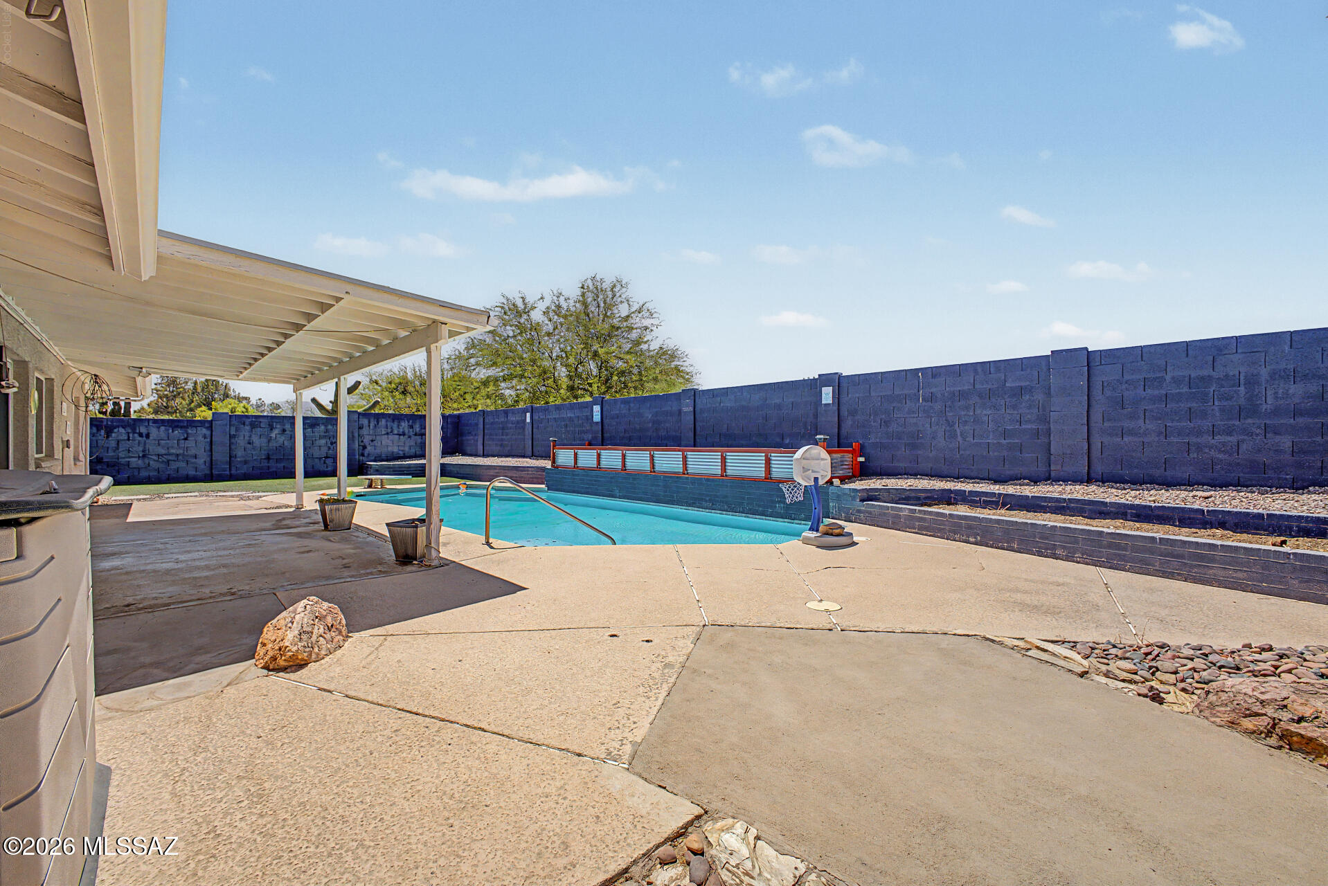 7550 East Rio Verde Drive Tucson, AZ 85715 - Photo 23 of 25 The sparkling pool, surrounding hardscape, and thoughtful design create the perfect outdoor retreat.