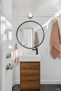 a view of a fire pit with flower plants