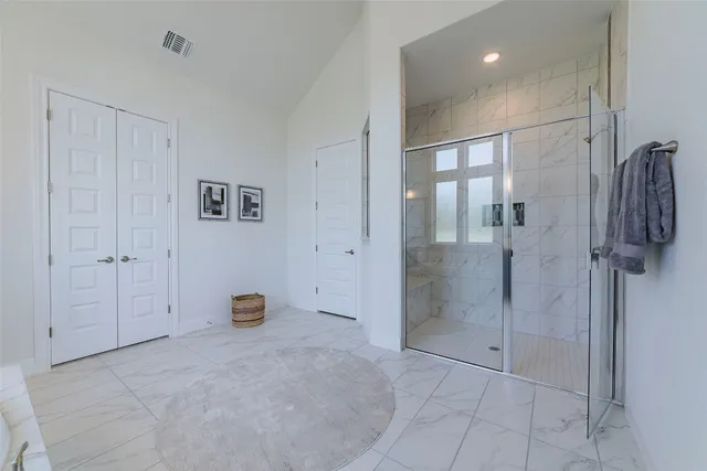a view of a bathroom with a shower