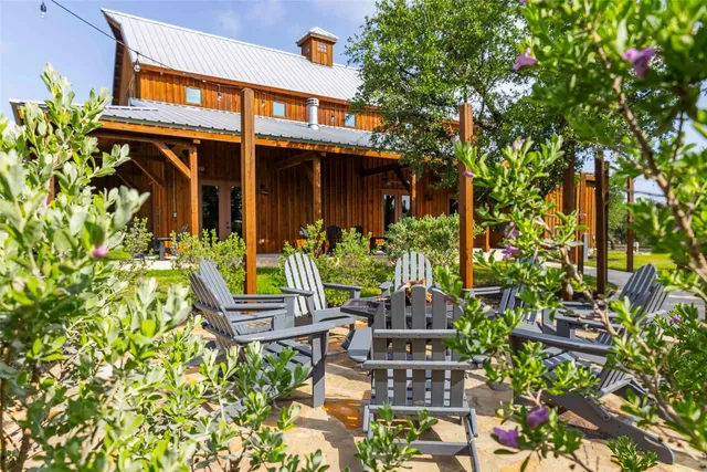 front view of a house with a bench