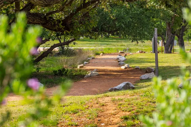 a view of swimming pool with a yard
