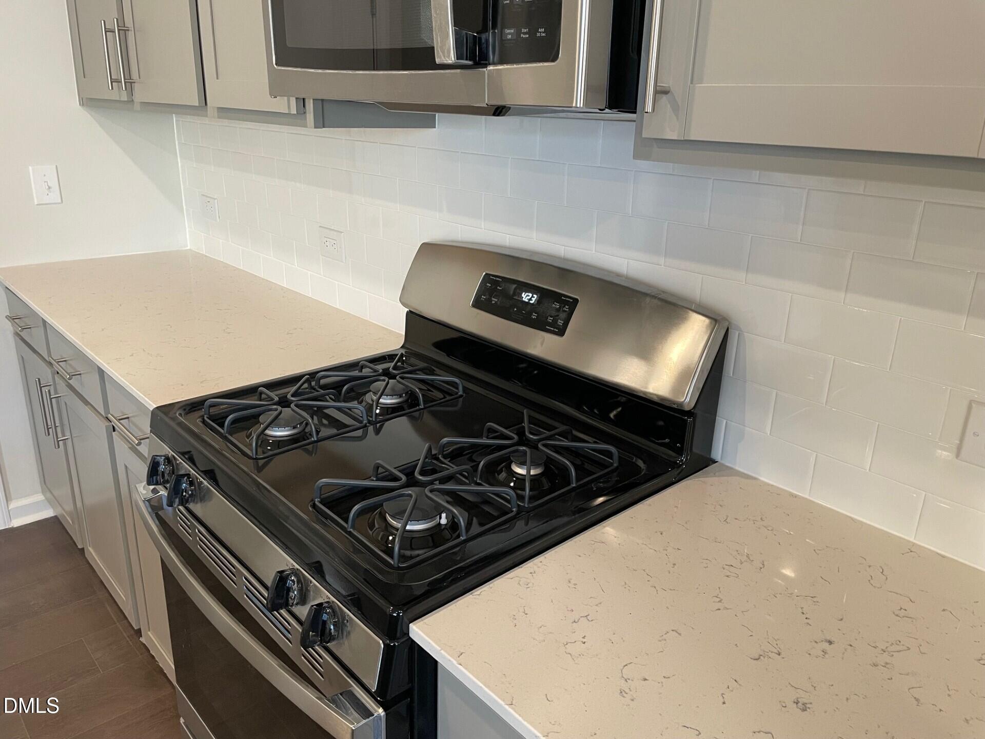 517 Hester Road Durham, NC 27703 - Photo 4 of 7 302 back splash and range