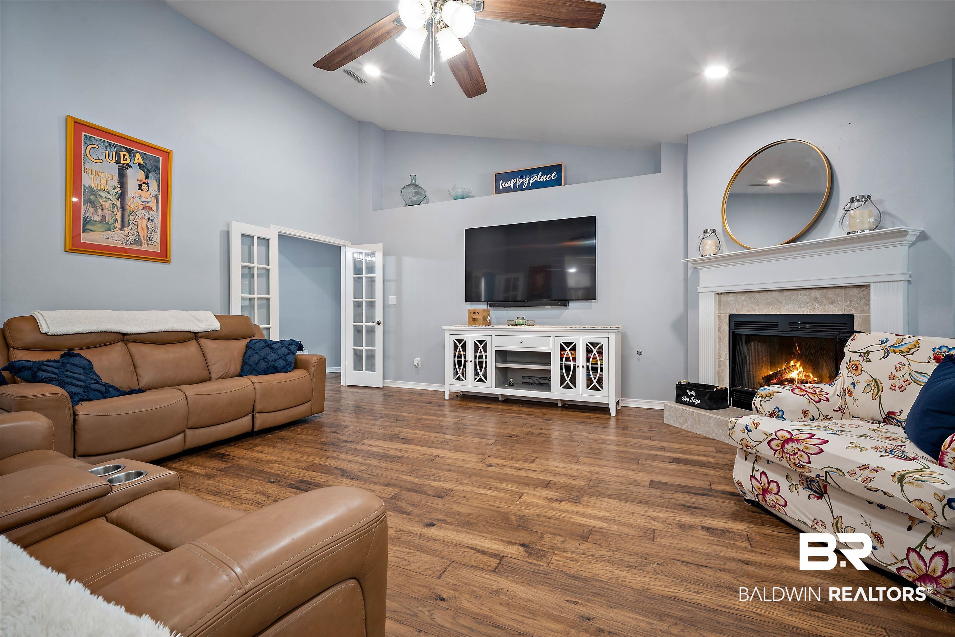 10713 Rigby Drive Mobile, AL 36695 - Photo 4 of 35 Living room with lofted ceiling, ceiling fan, wood finished floors, a fireplace, and recessed lighting