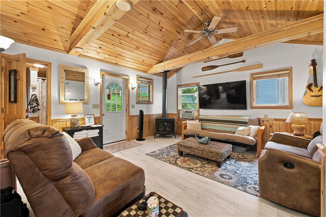 1942 West Shore Road Howard, NY 14810 - Photo 11 of 47 cathedral ceilings with cozy gas stove