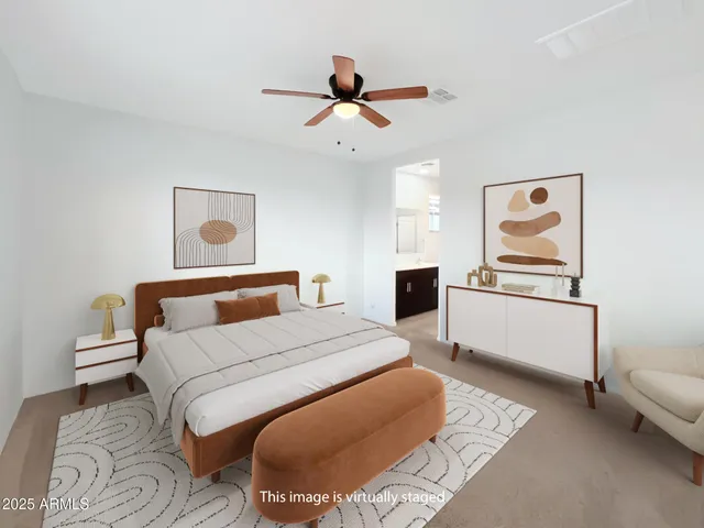 a view of empty room with ceiling fan