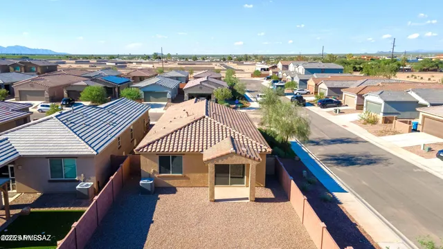 swimming pool view with a seating space