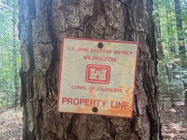2510 Tody Goodwin Road Apex, NC 27502 - Photo 22 of 23 a sign on the wall of the tree