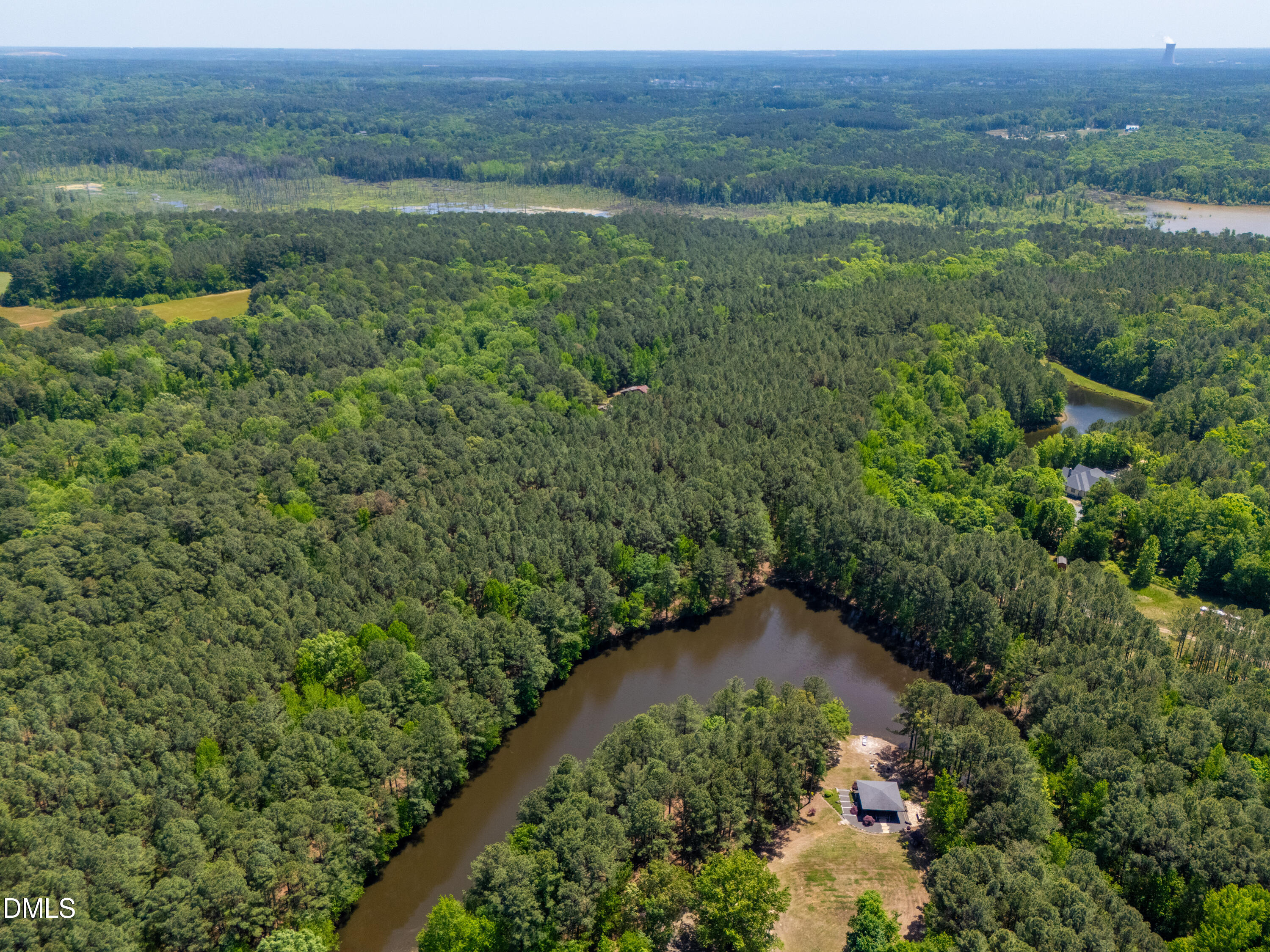 2510 Tody Goodwin Road Apex, NC 27502 - Photo 30 of 30 an aerial view of green landscape with trees houses and mountain view