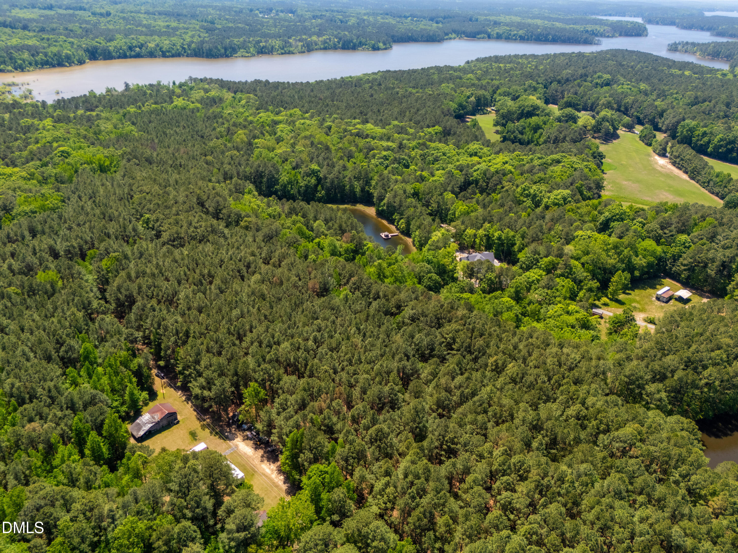 2510 Tody Goodwin Road Apex, NC 27502 - Photo 4 of 30 a view of a lake with a park