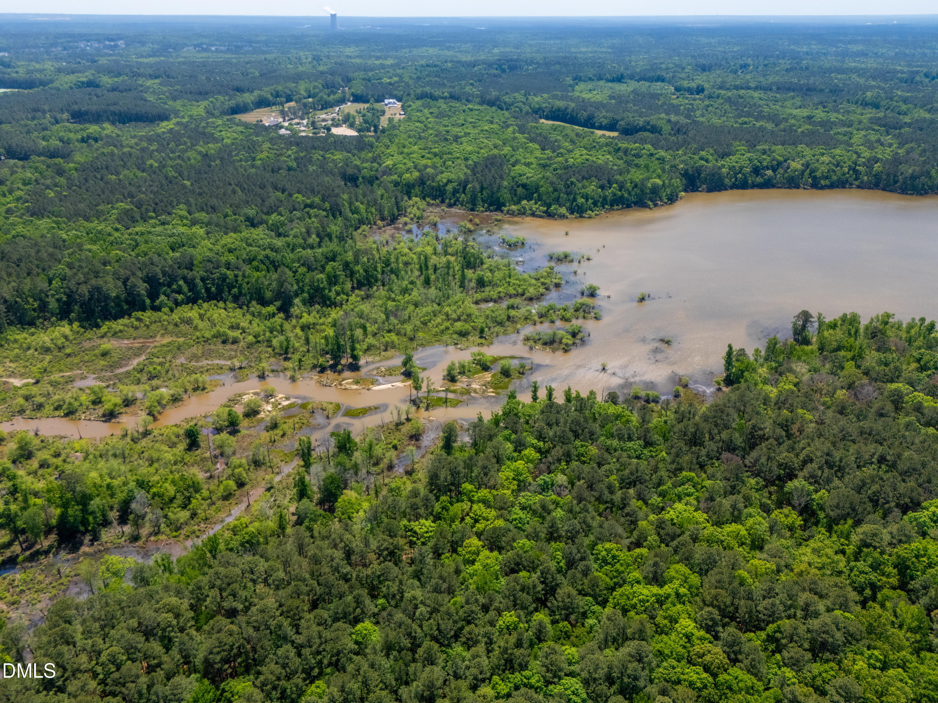 2510 Tody Goodwin Road Apex, NC 27502 - Photo 6 of 30 an aerial view of a houses with a yard and lake view