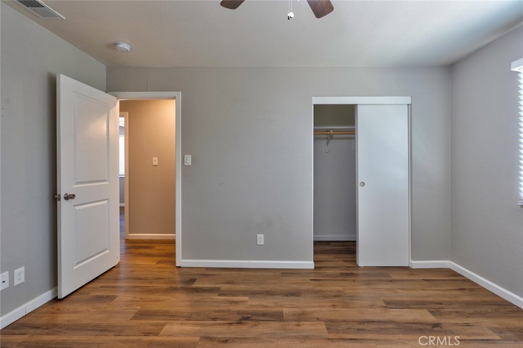 1840 Cheyenne Drive Merced, CA 95348 - Photo 69 of 90 an empty room with wooden floor and entrance