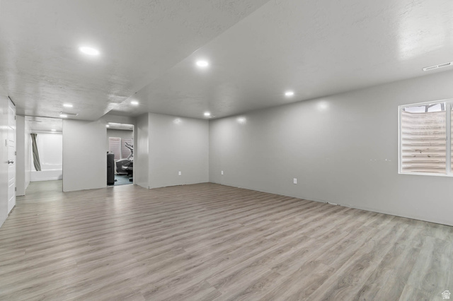 5686 Duke Lane Tooele, UT 84074 - Photo 30 of 38 Below grade area featuring recessed lighting and light wood-style flooring