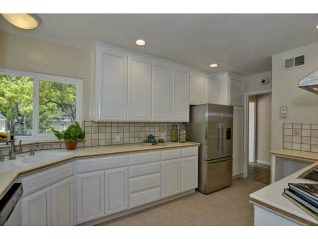 1030 Covington Road Los Altos, CA 94024 - Photo 5 of 14 a kitchen with a refrigerator and a sink