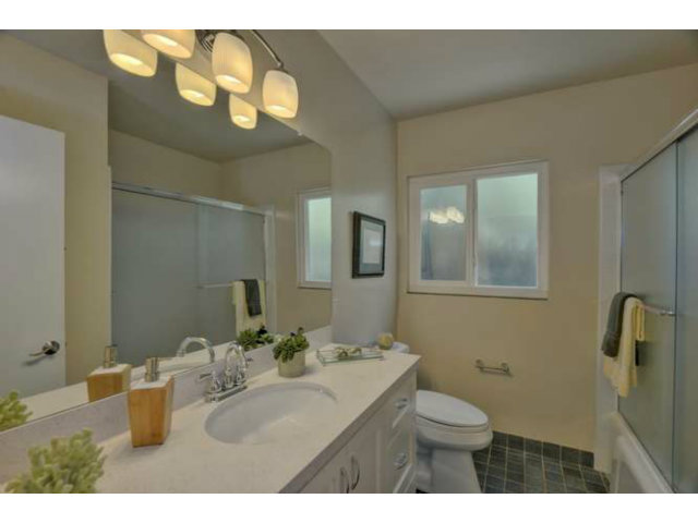 1030 Covington Road Los Altos, CA 94024 - Photo 9 of 14 a bathroom with a sink and a mirror