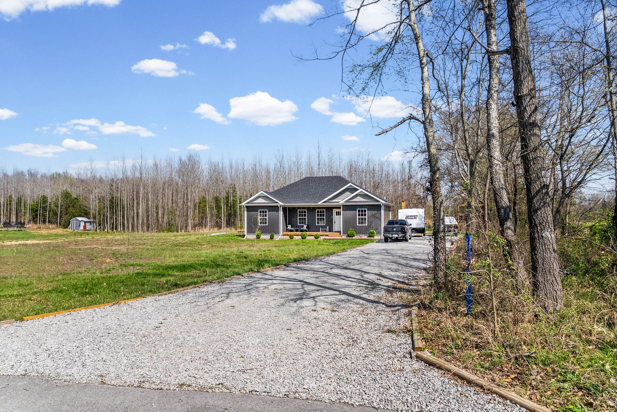 352 Scott Road Sharon Grove, KY 42280 - Photo 2 of 26 a view of a house with a yard