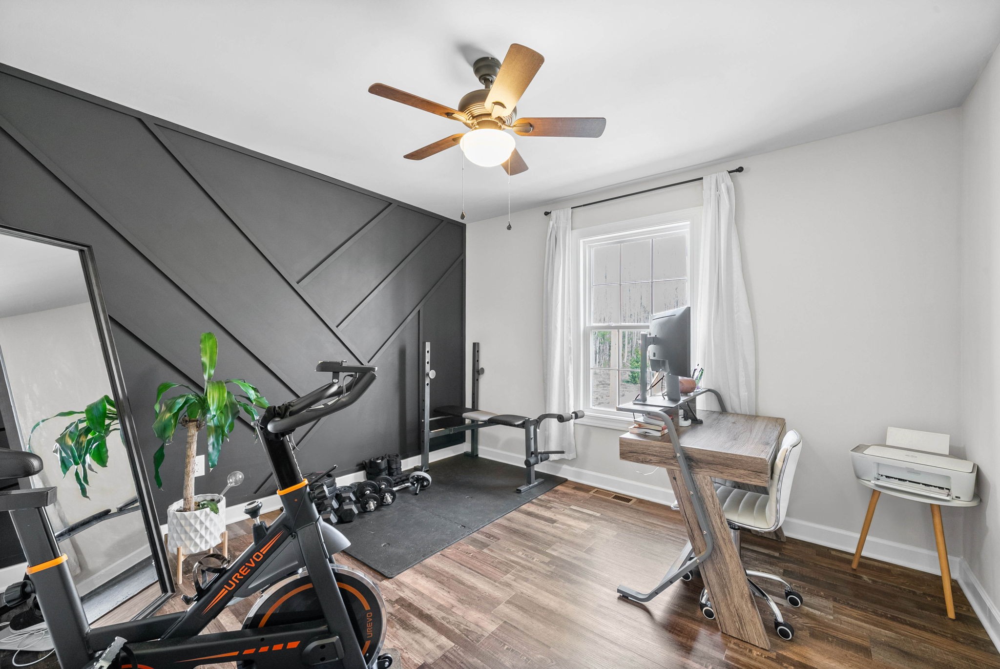 352 Scott Road Sharon Grove, KY 42280 - Photo 21 of 26 a view of a workspace with furniture and a ceiling fan