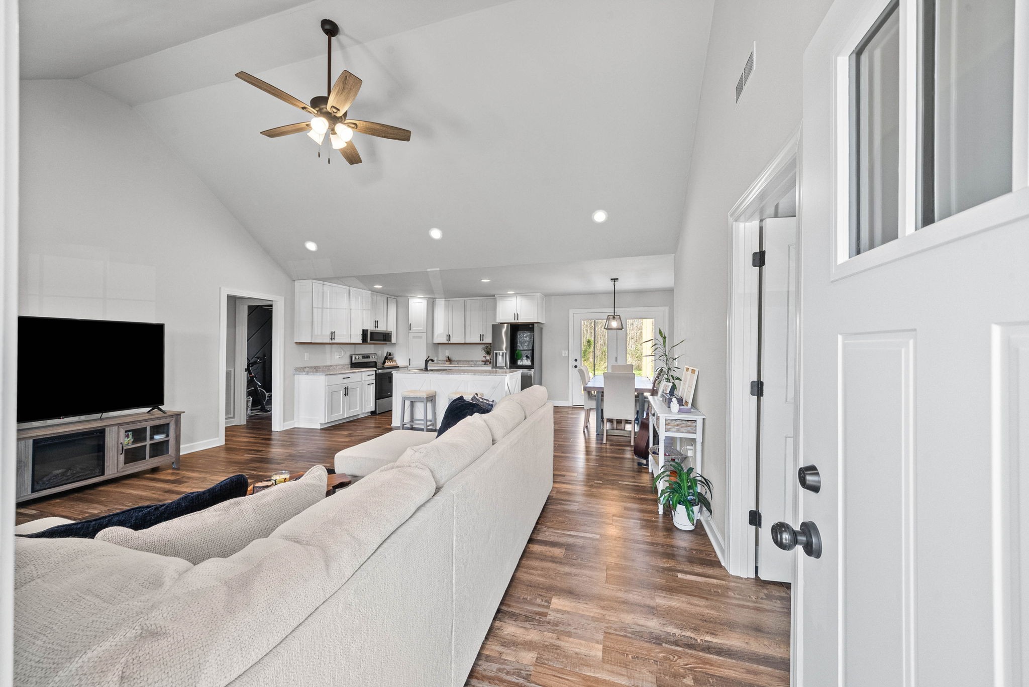 352 Scott Road Sharon Grove, KY 42280 - Photo 5 of 26 a living room with furniture a flat screen tv and kitchen view