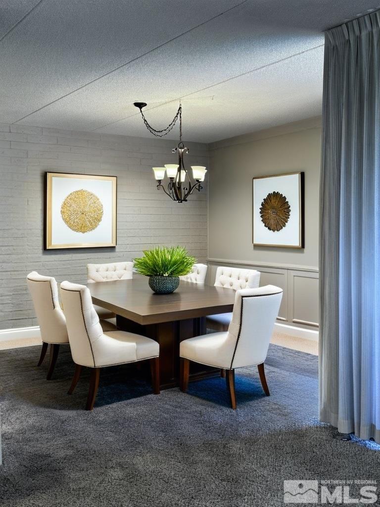 1200 Riverside Drive, Unit 1239 Reno, NV 89503 - Photo 12 of 35 a view of a dining room with furniture and chandelier