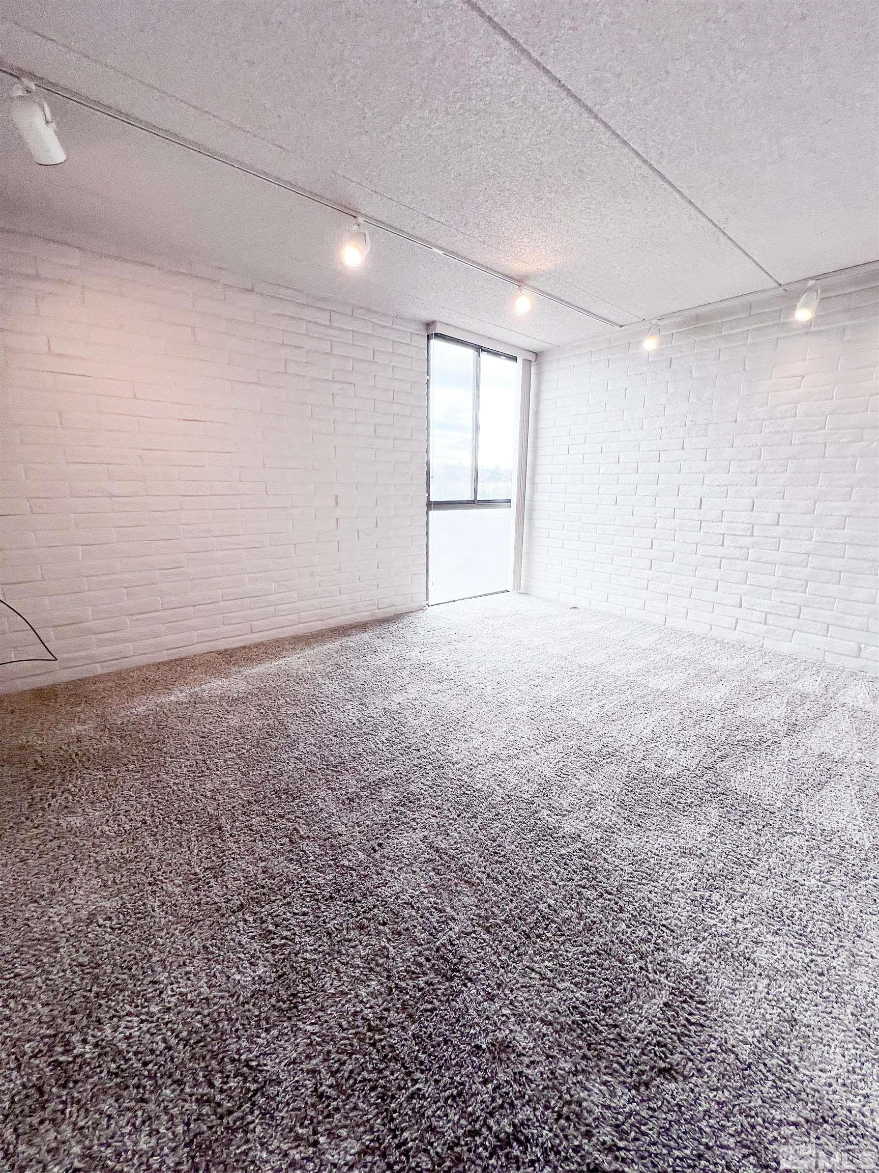 1200 Riverside Drive, Unit 1239 Reno, NV 89503 - Photo 24 of 35 wooden floor in an empty room