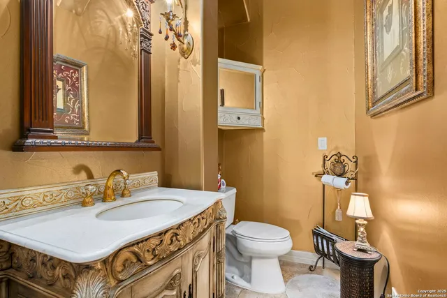 a view of living room with furniture and wooden floor
