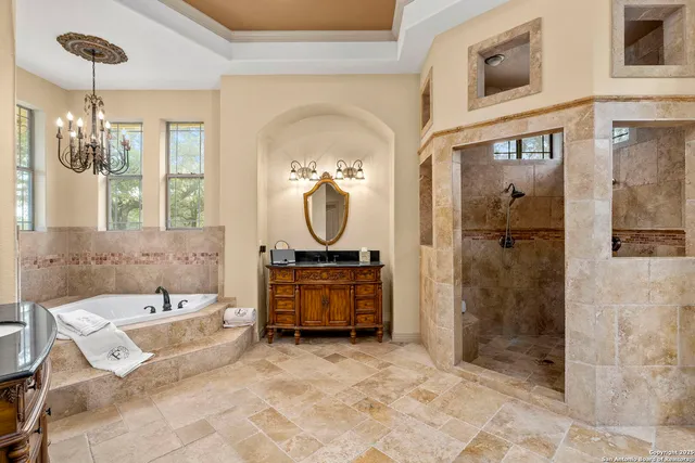 a bathroom with a bathtub and a sink