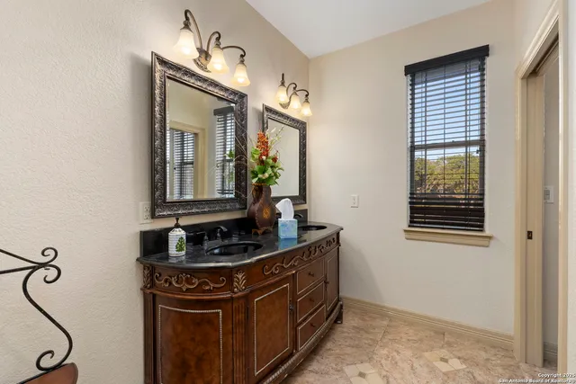 a white toilet sitting next to a bath tub