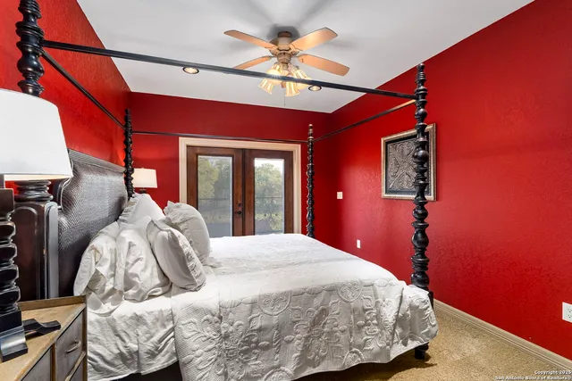 a bathroom with a sink mirror vanity and toilet