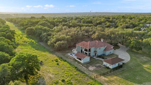 a view of a house with a big yard