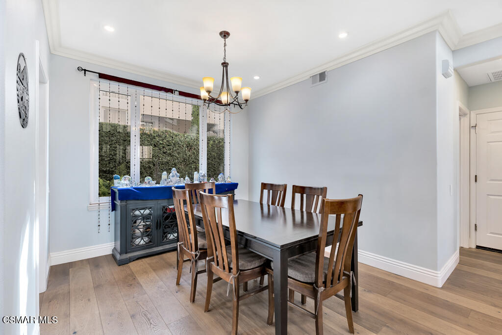 11177 Terraceridge Road Moorpark, CA 93021 - Photo 12 of 54 a view of a dining room with furniture window and wooden floor