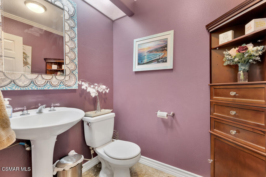 11177 Terraceridge Road Moorpark, CA 93021 - Photo 21 of 54 a bathroom with a sink mirror and toilet