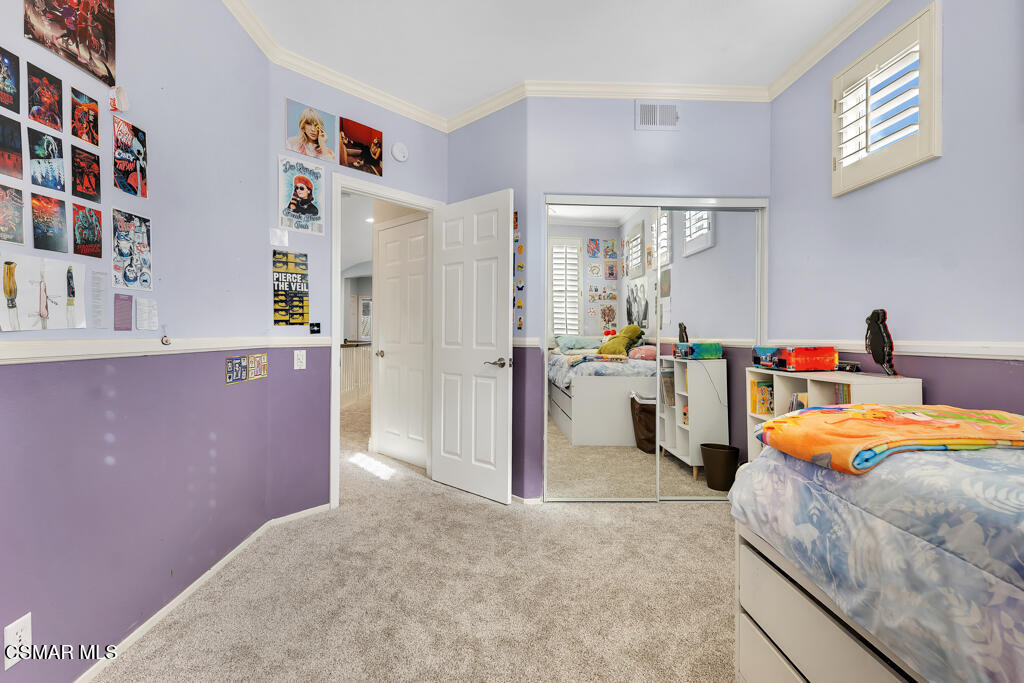 11177 Terraceridge Road Moorpark, CA 93021 - Photo 31 of 54 a bedroom with a bed and a cabinets