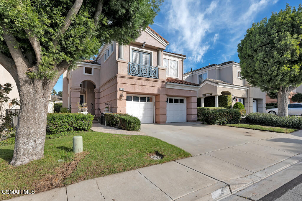11177 Terraceridge Road Moorpark, CA 93021 - Photo 43 of 54 a front view of a house with a garden and plants
