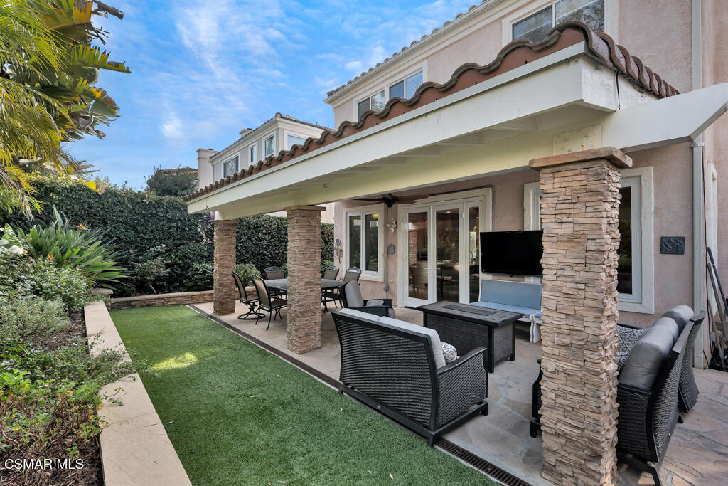 11177 Terraceridge Road Moorpark, CA 93021 - Photo 6 of 54 a view of a house with backyard sitting area and garden
