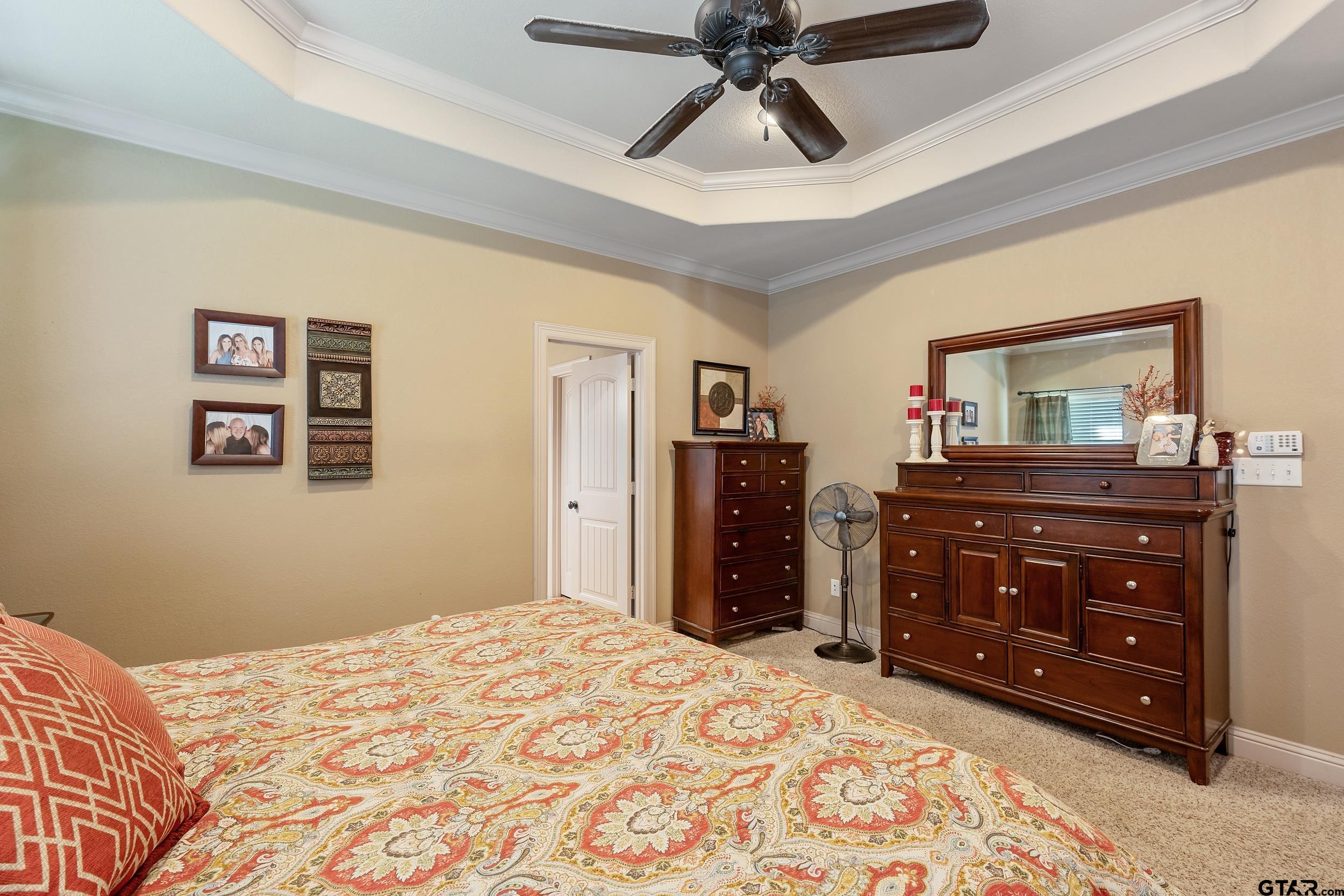140 Creek Drive Marshall, TX 75672 - Photo 18 of 35 a bedroom with a bed and a dresser