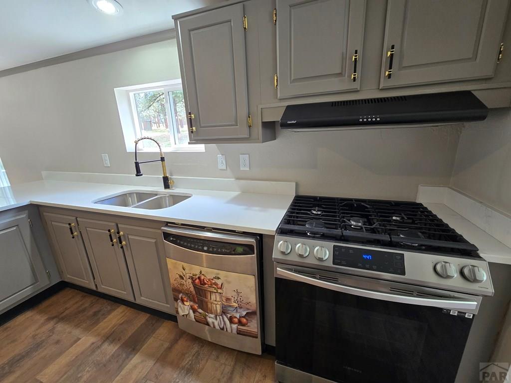 8229 Green Lane Rye, CO 81069 - Photo 6 of 24 a stove top oven sitting inside of a kitchen