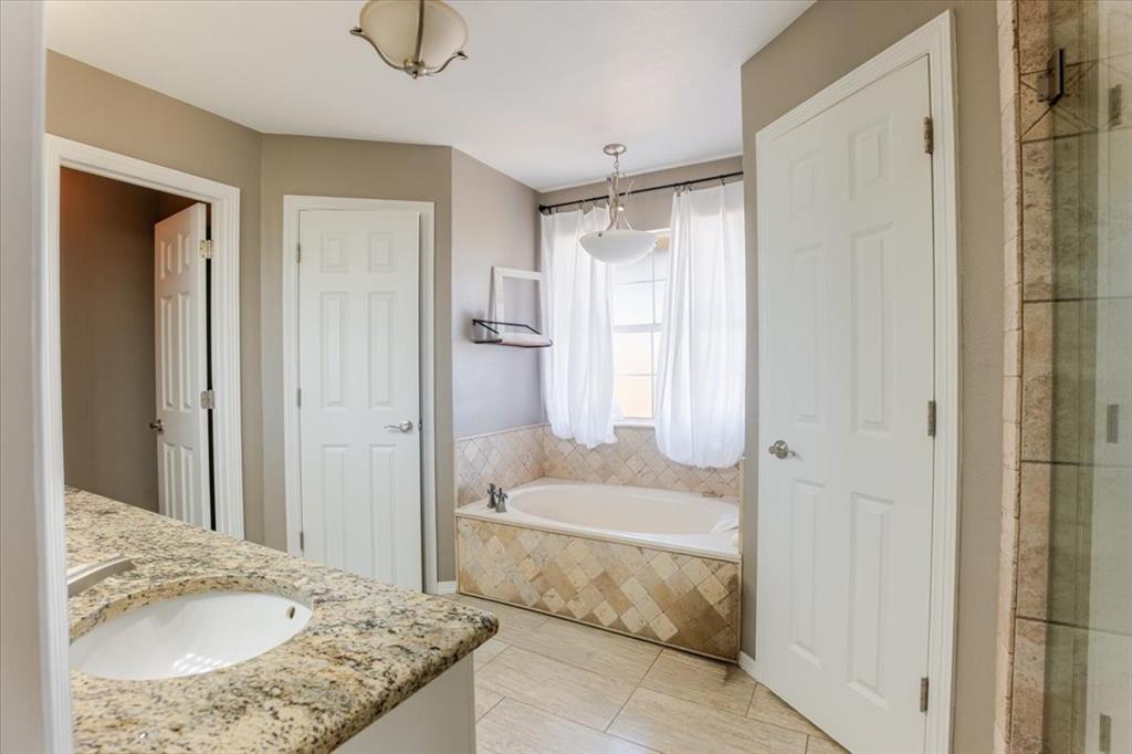 4600 East Lone Star Road Poolville, TX 76487 - Photo 16 of 24 His and Her walk in closets