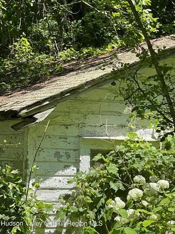 a view of a lake with a tree